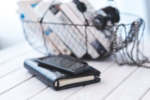 Picture of a fitness journal, phone, and basket